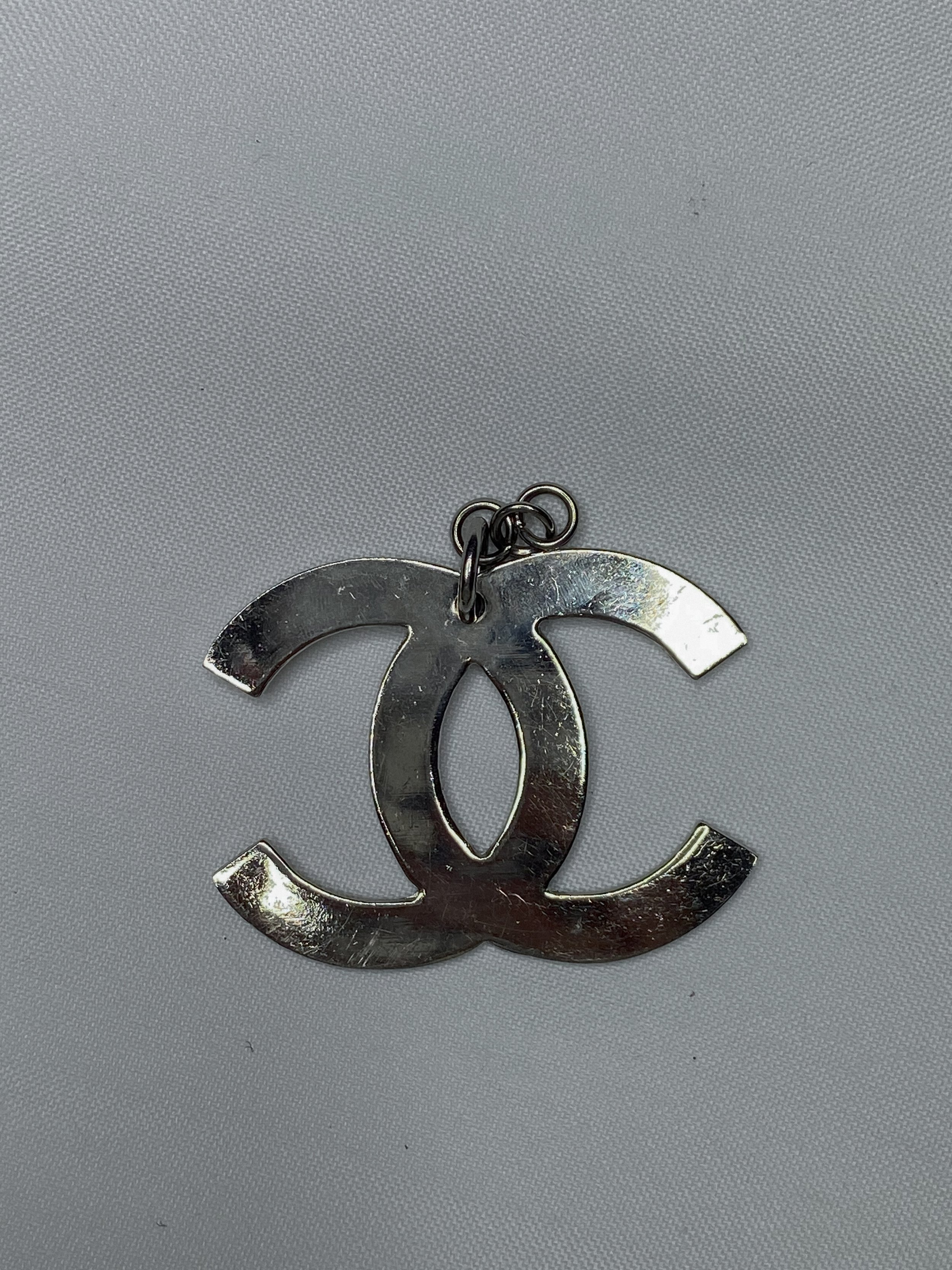 Chanel Logo Silver Pendant — JYNX VNTG